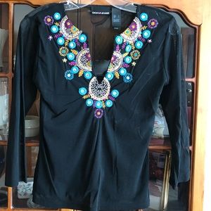 DKNY black mesh top with design.
